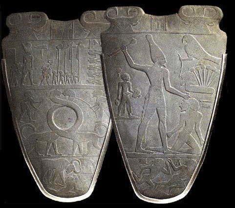 Two sides of the stone palette of Narmer showing engravings
