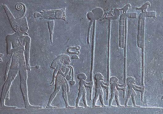 Detail of the palette of Narmer showing an engraving of people in a line