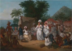 Image of women of color wearing white with head wraps walking in an outdoor market.