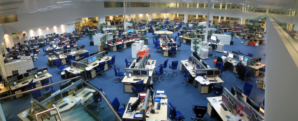 This photo shows a large open newsroom with enough space to seat about 200 employees.
