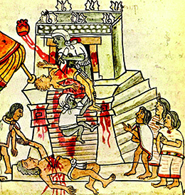 An illustration shows an Aztec priest cutting the beating heart out of a sacrificial victim.